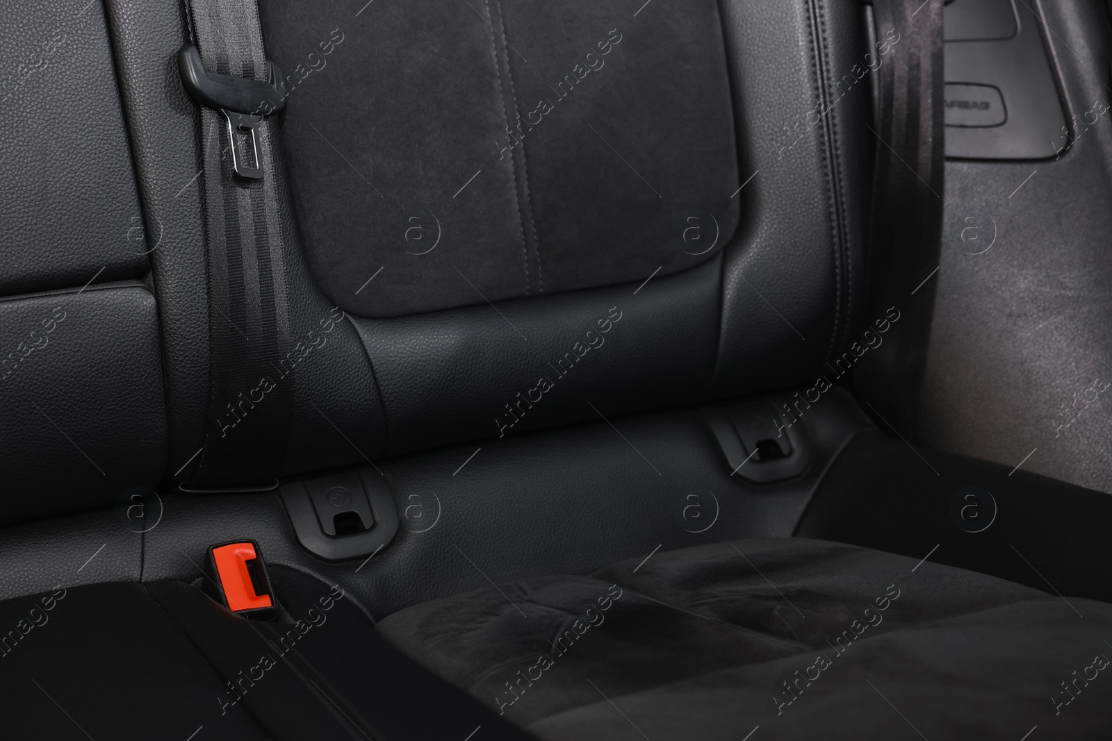 Photo of Clean leather seat inside of modern black car