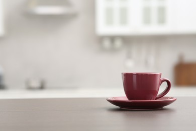 Photo of Cup of drink on counter in kitchen, space for text