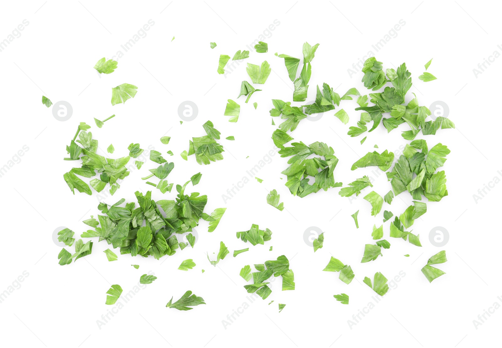 Chopped parsley leaves isolated on white, top view Photo of Chopped parsley leaves isolated on white, top view
