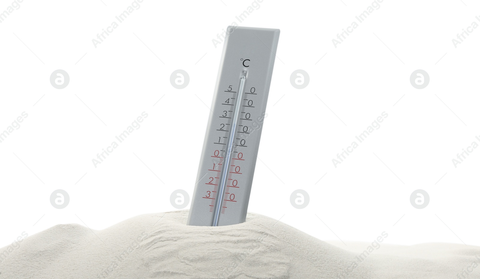 Photo of Weather thermometer in sand against white background