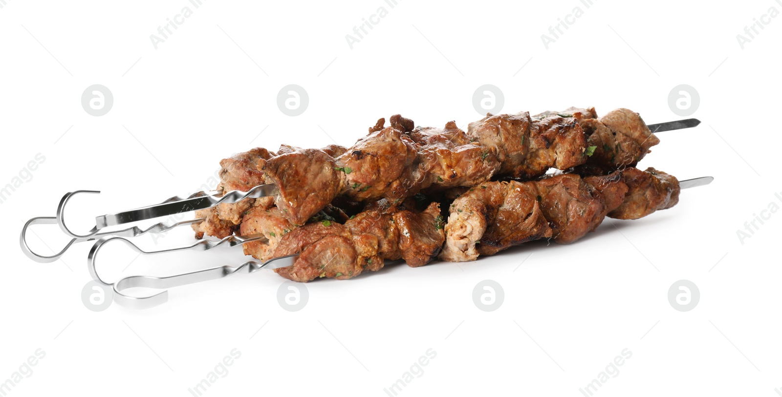 Photo of Metal skewers with delicious meat on white background