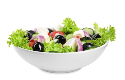 Tasty fresh Greek salad on white background