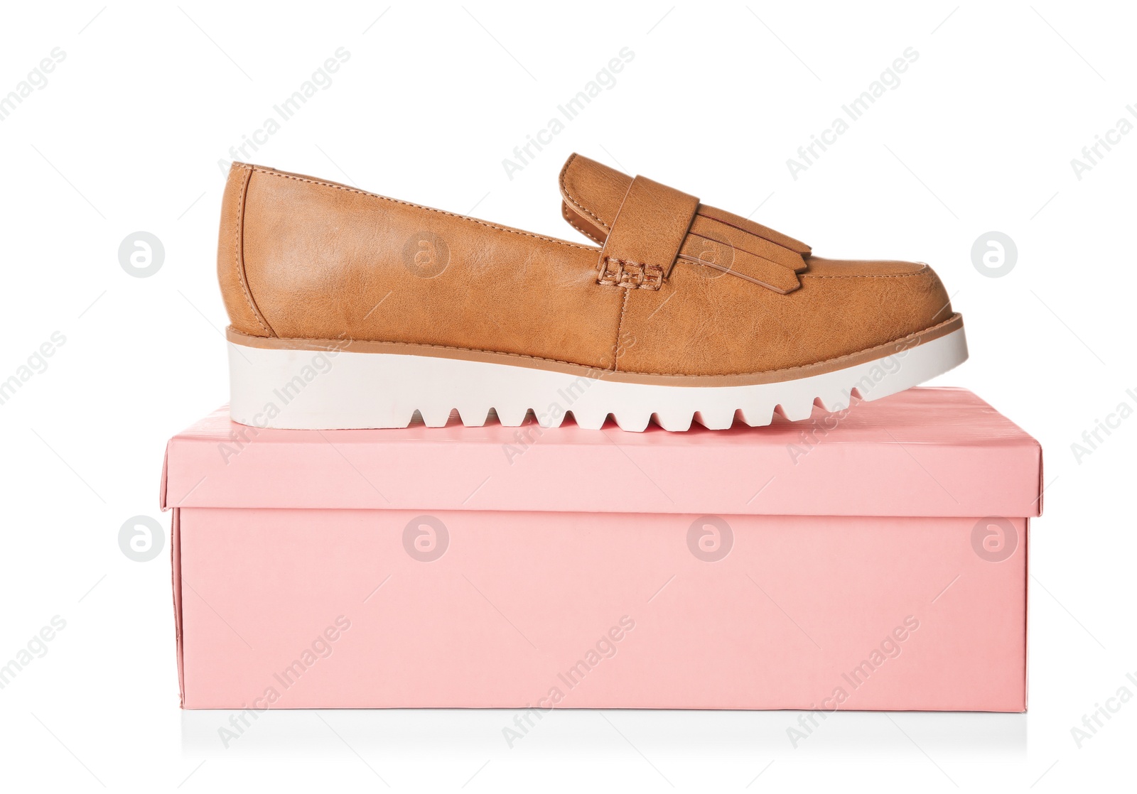 Photo of Female shoe and box on white background