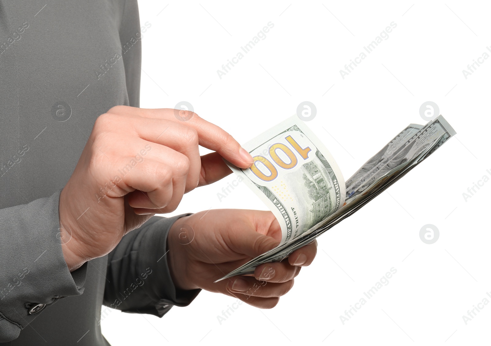 Photo of Money exchange. Woman counting dollar banknotes on white background, closeup