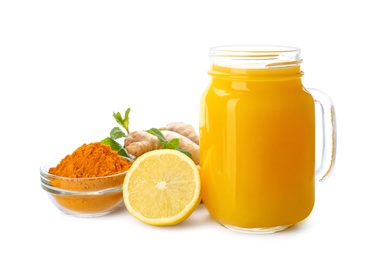 Immunity boosting drink with lemon, ginger and turmeric on white background