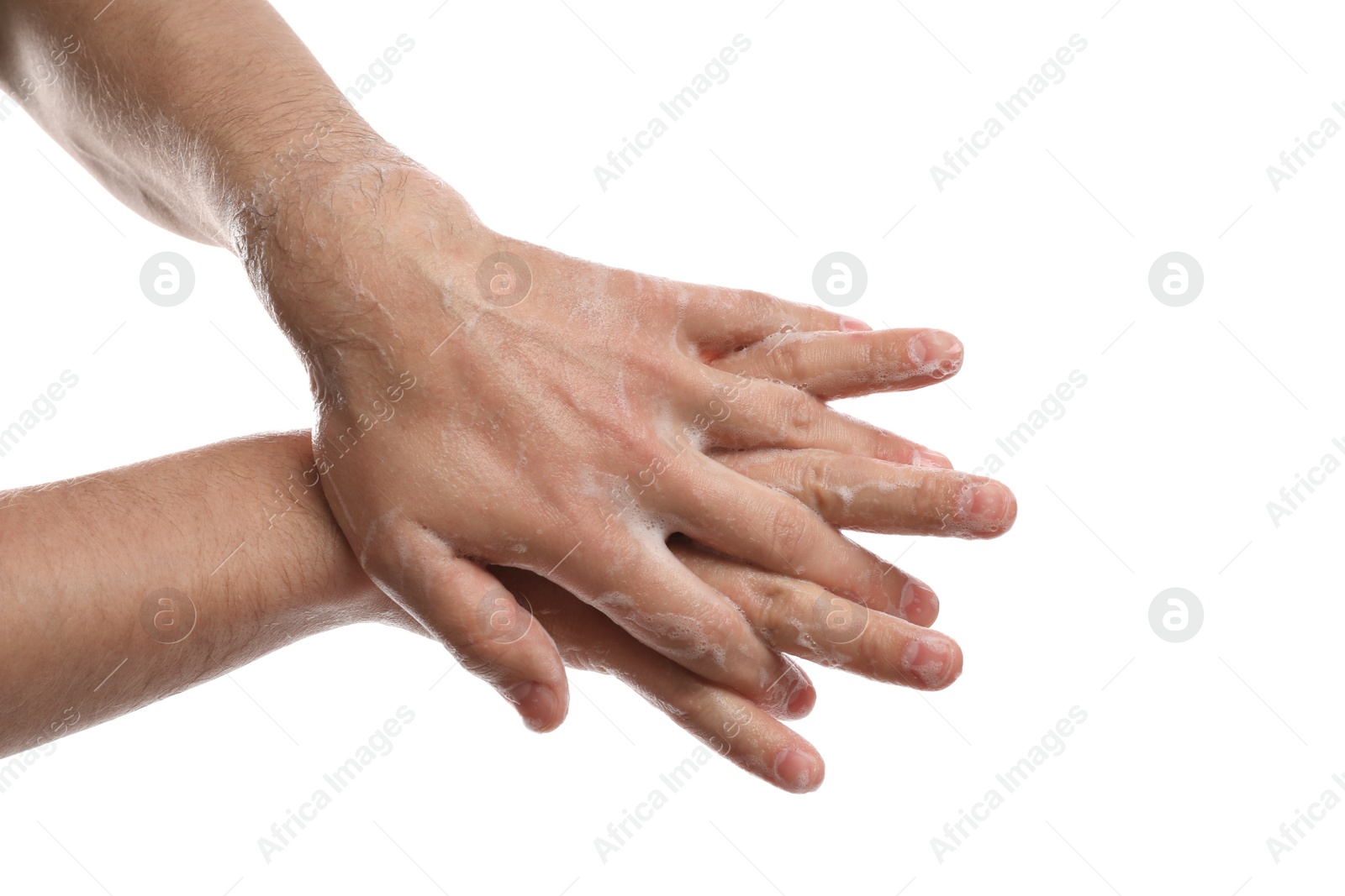 Photo of Man washing hands with soap on white background, closeup