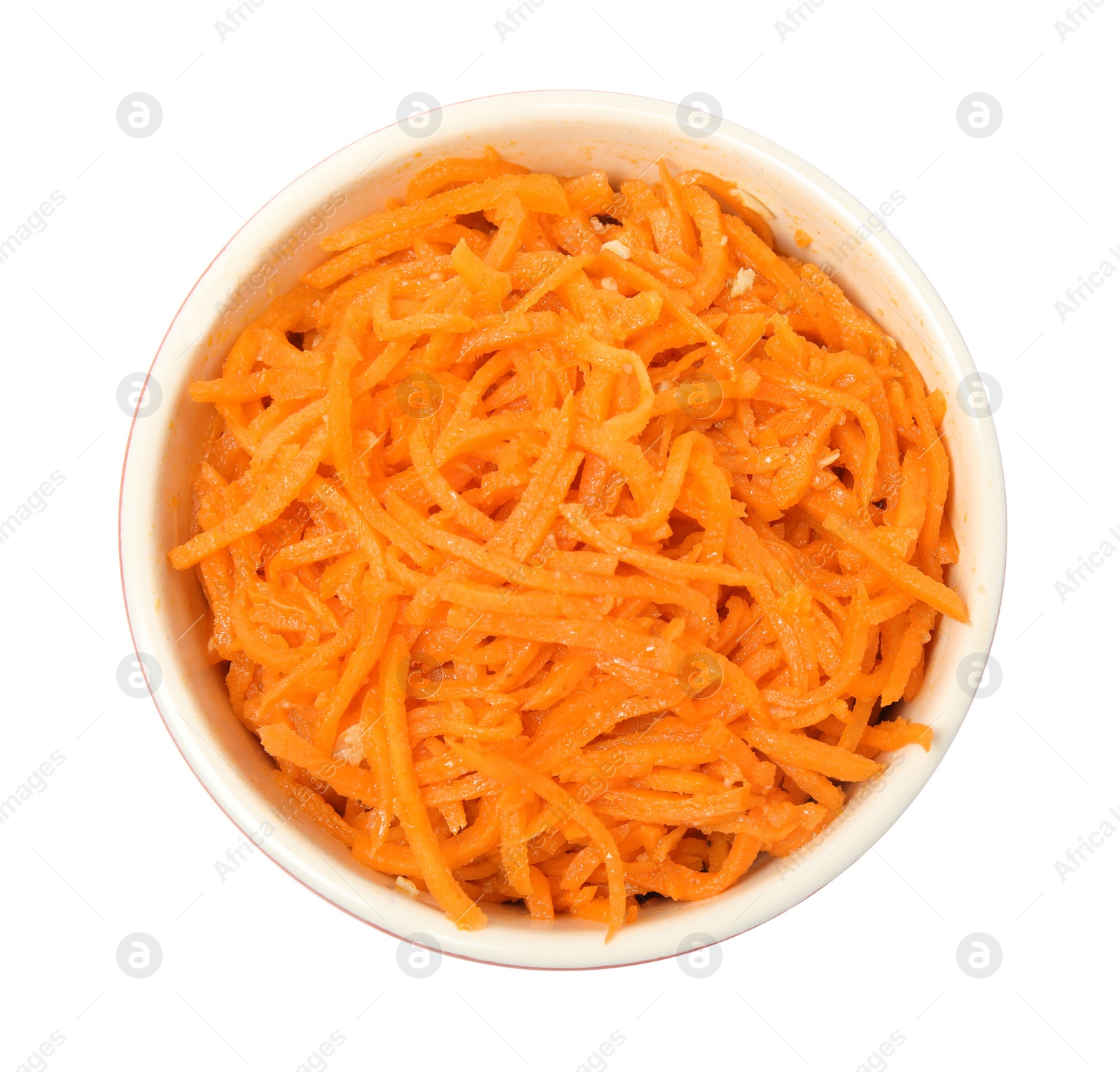 Photo of Delicious Korean carrot salad in bowl isolated on white, top view