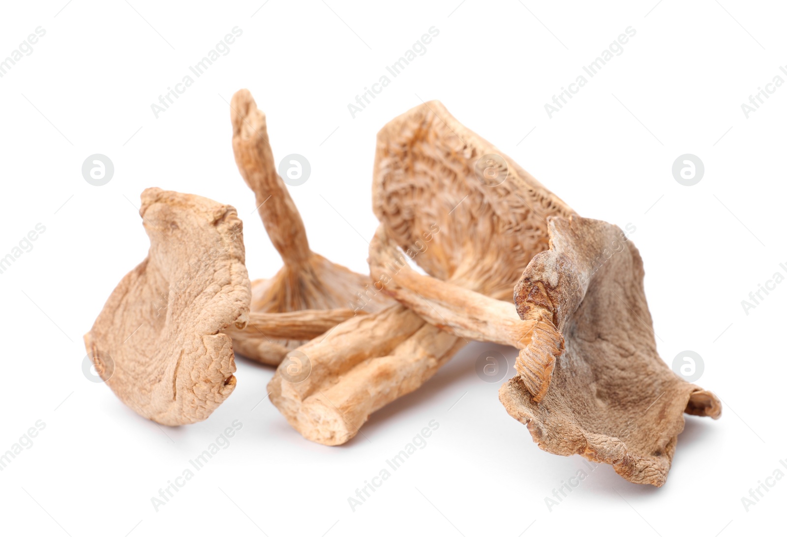 Photo of Delicious organic dried mushrooms on white background