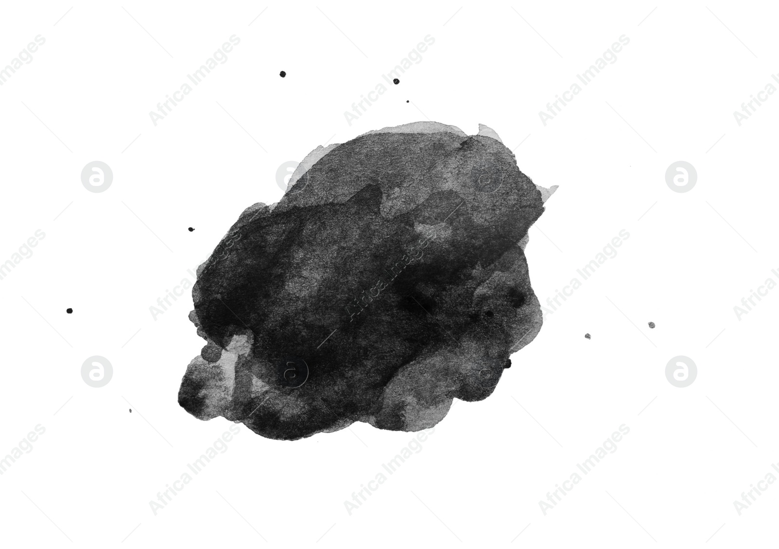 Photo of Blot of black watercolor paint on white background