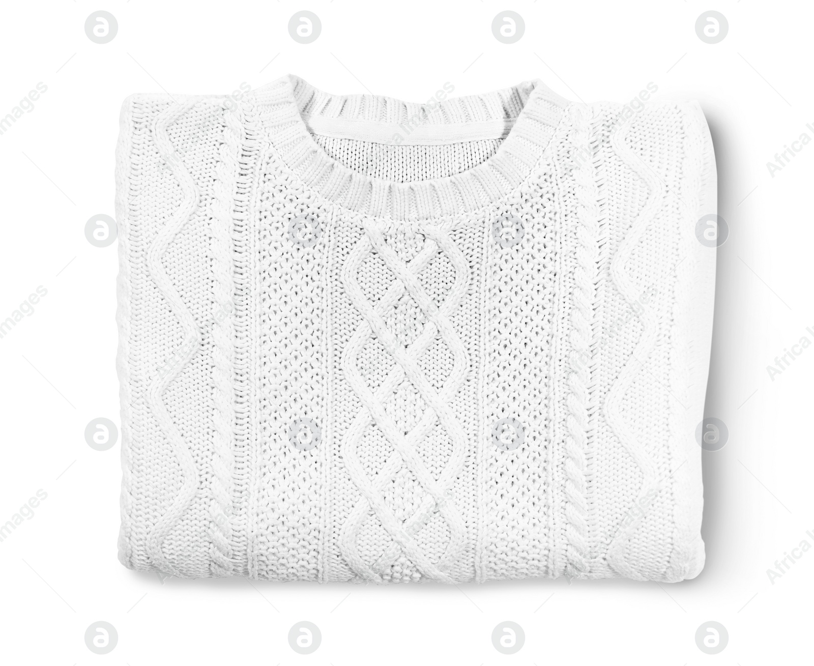 Photo of Folded cozy warm sweater on white background, top view