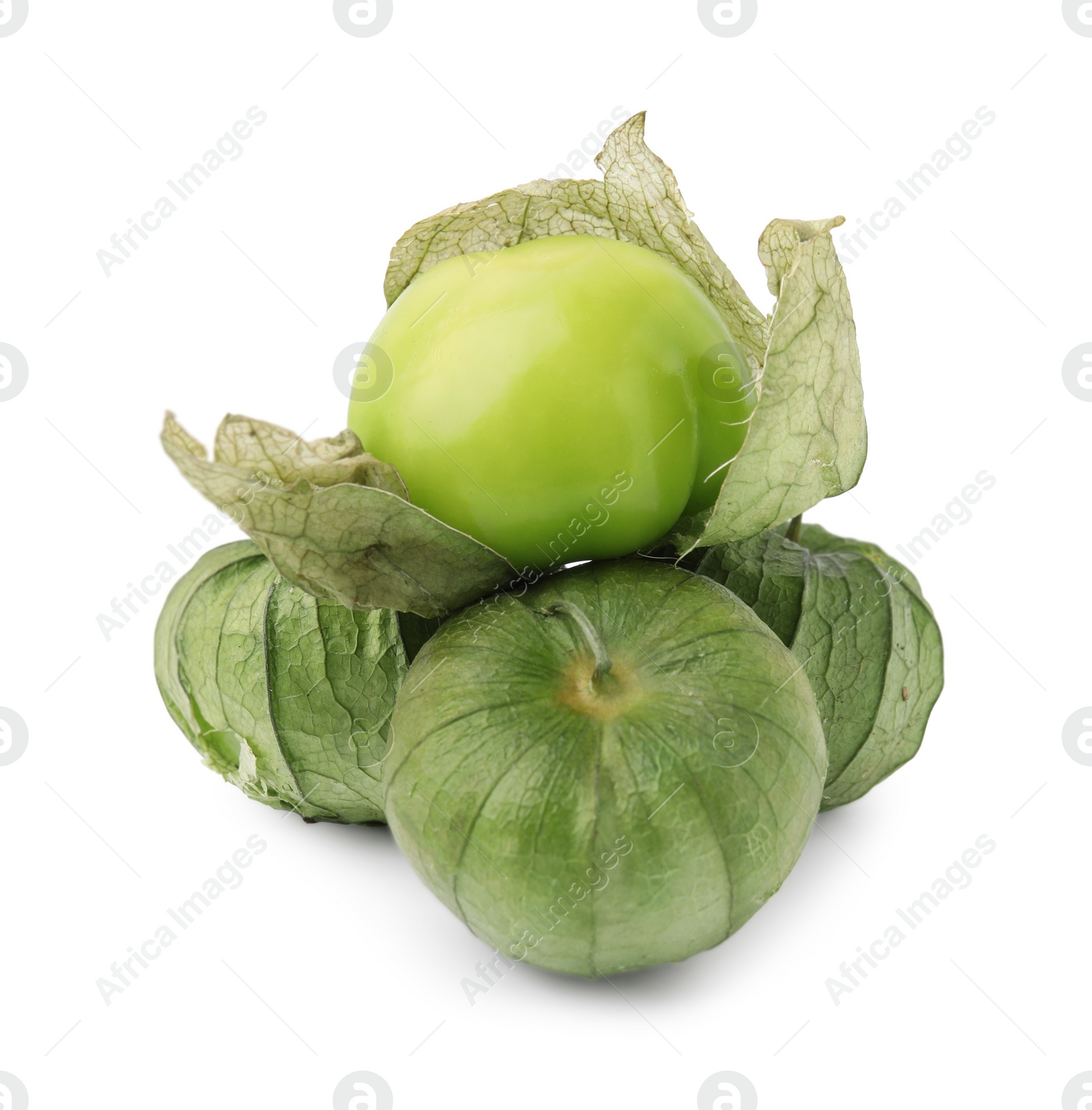 Photo of Fresh green tomatillos with husk isolated on white