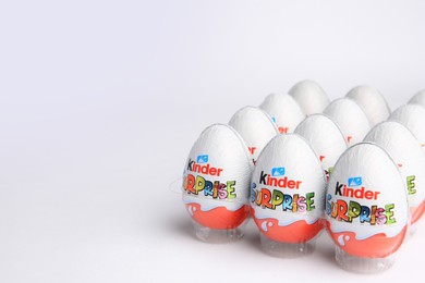 Photo of Sveti Vlas, Bulgaria - June 26, 2023: Kinder Surprise Eggs in plastic tray on white background. Space for text