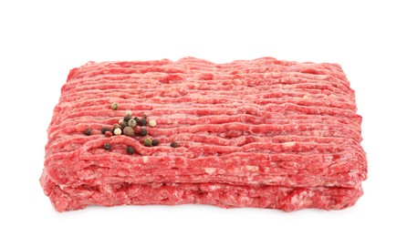 Photo of Raw ground meat and peppercorns isolated on white