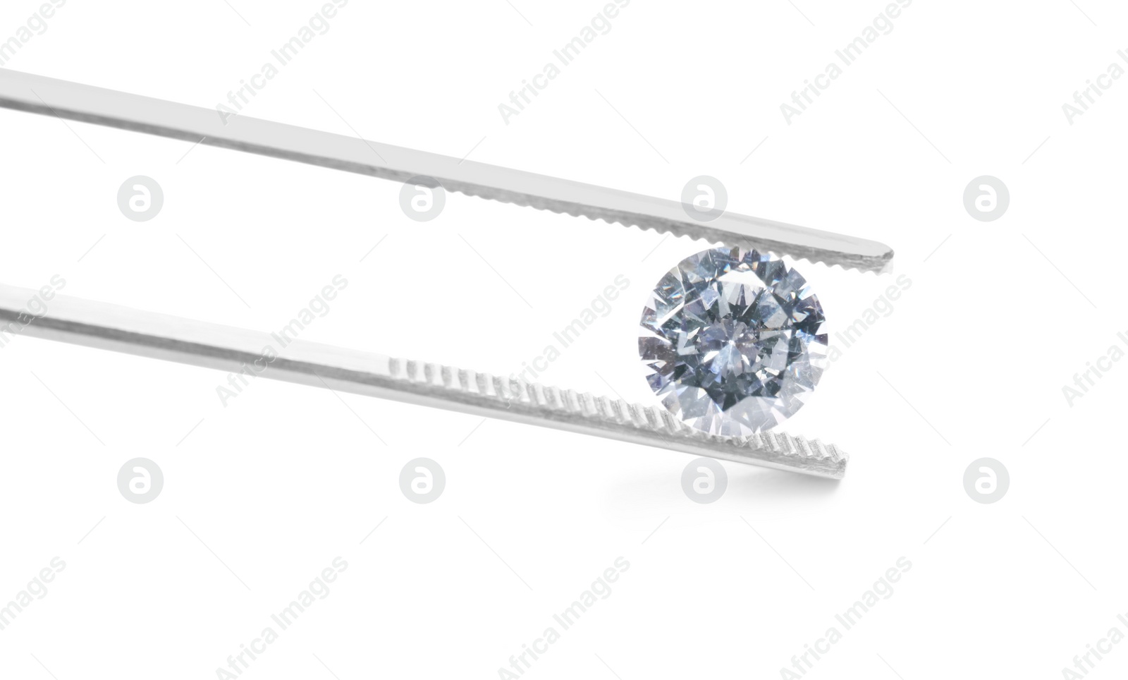 Photo of Tweezers with beautiful shiny diamond isolated on white