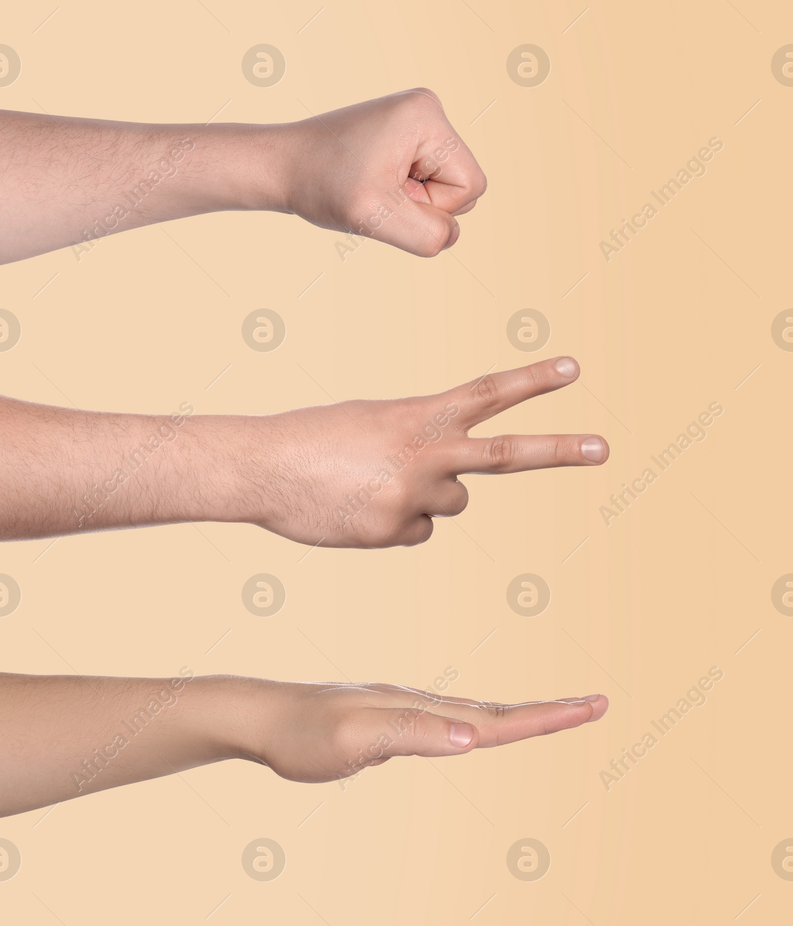 Image of People playing rock, paper and scissors on beige background, closeup