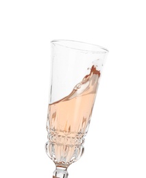 Photo of Glass of rose champagne on white background