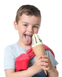 Adorable little boy with delicious ice cream on white background