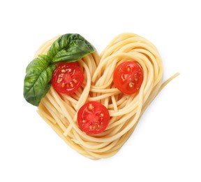 Heart made of tasty pasta, cut tomatoes and basil isolated on white