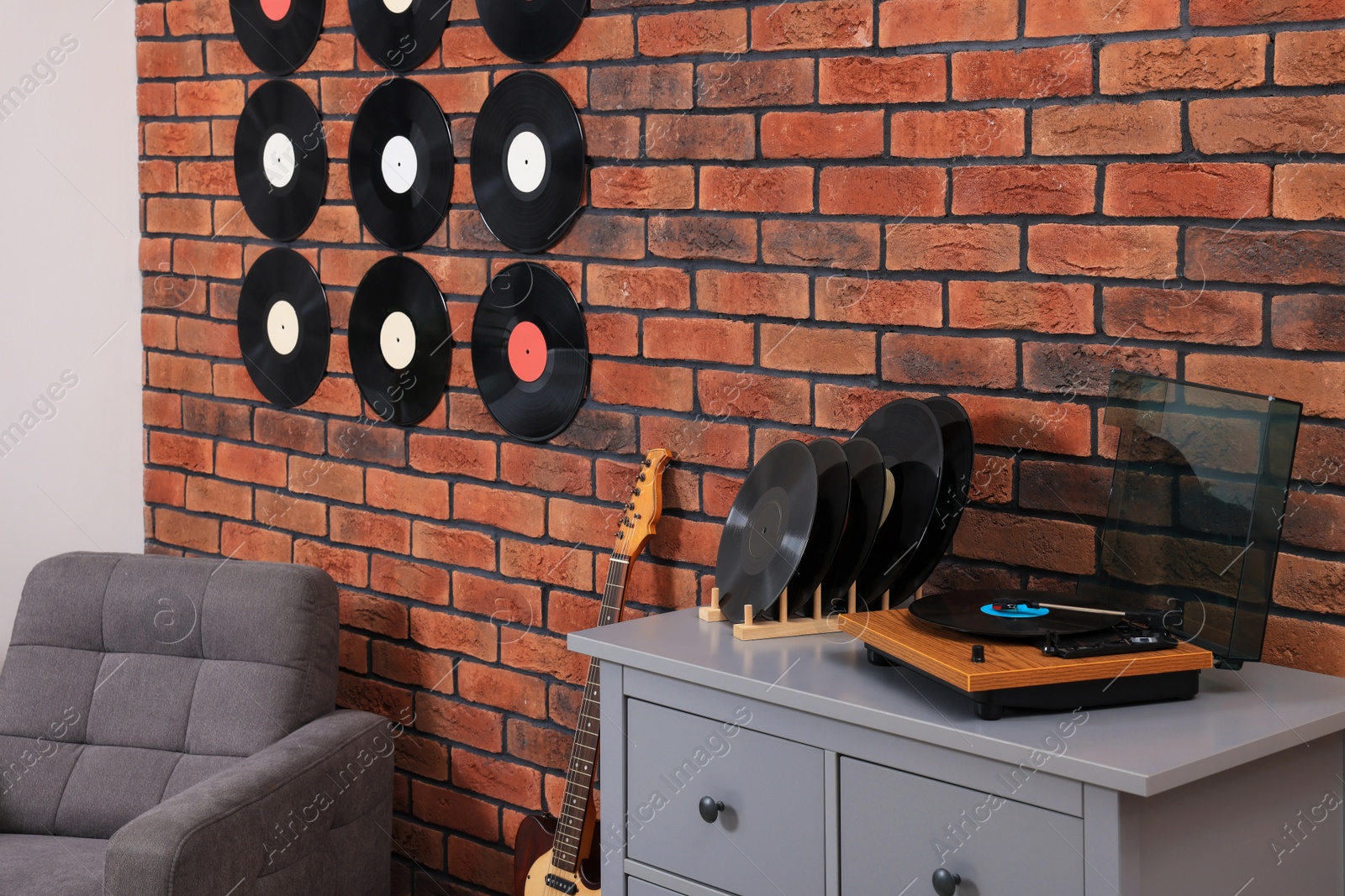 Photo of Living room decorated with vinyl records. Interior design