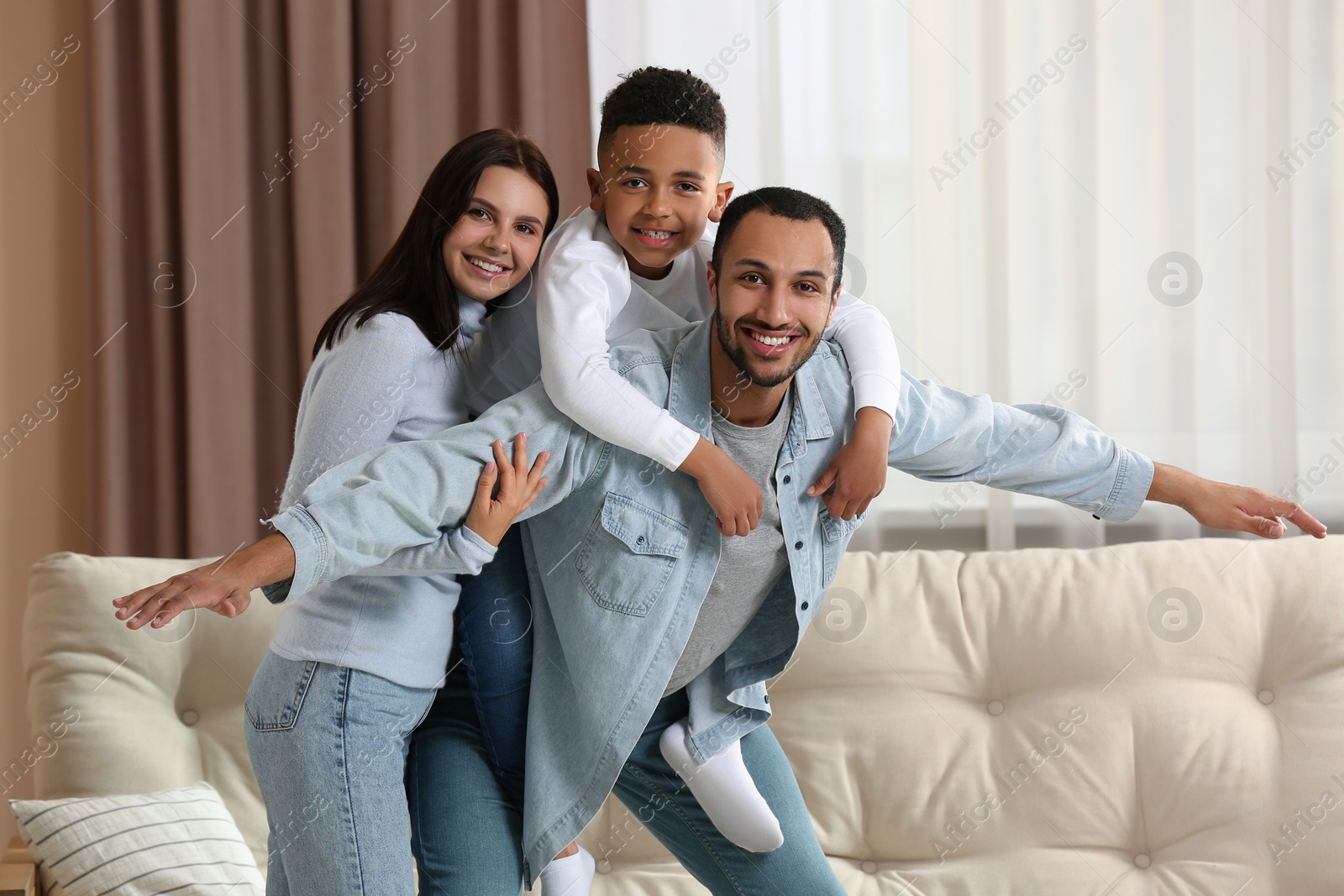 Photo of Happy international family spending time together at home