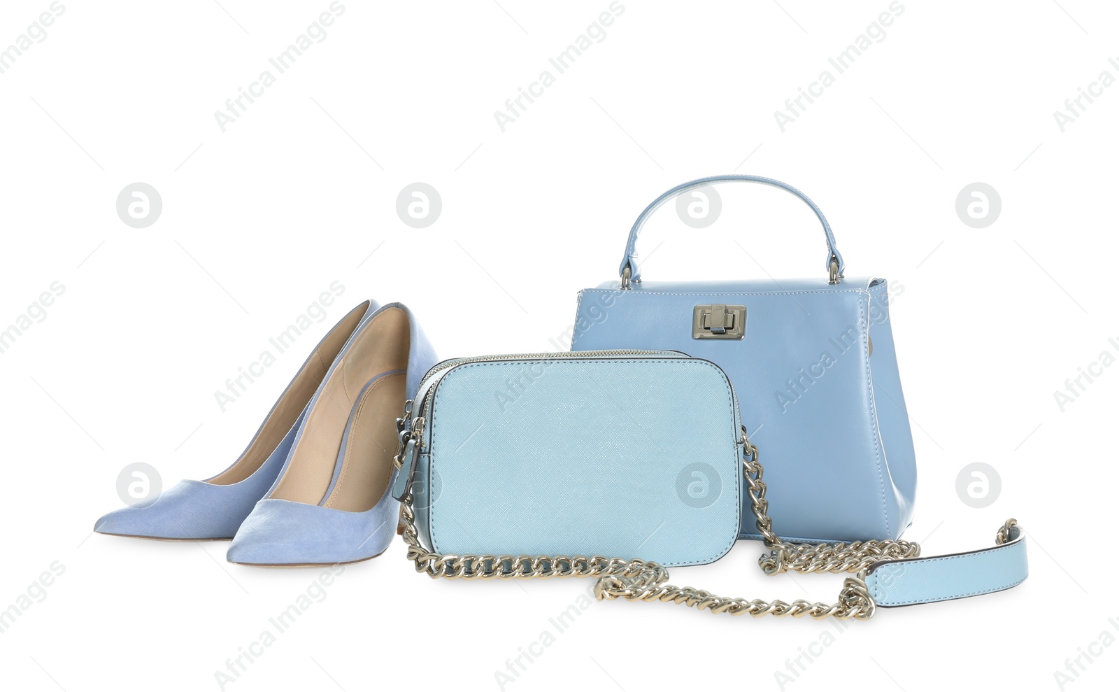 Photo of Different stylish woman's bags and shoes isolated on white