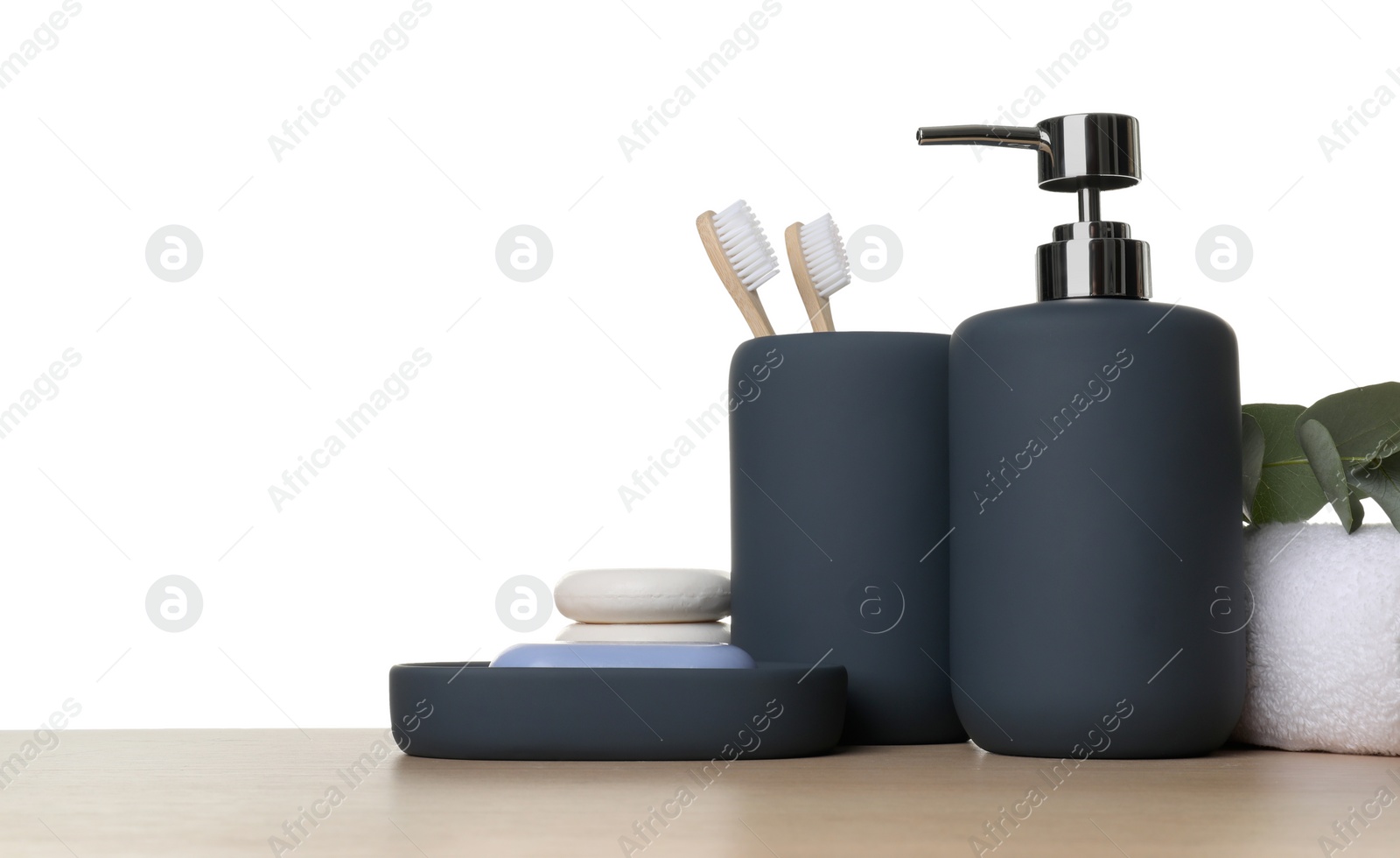 Photo of Bath accessories. Different personal care products on wooden table against white background. Space for text