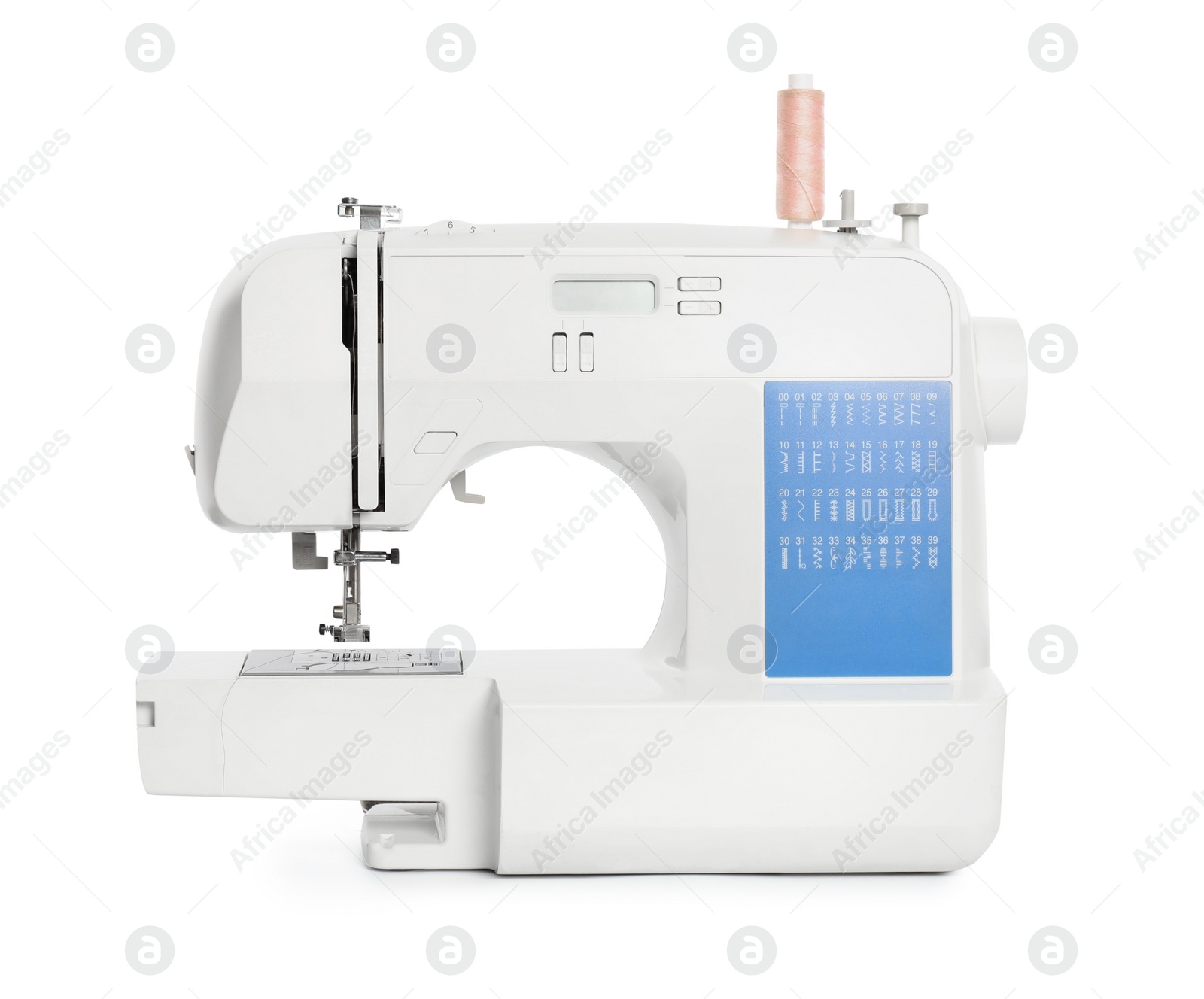 Photo of Modern sewing machine with pink thread isolated on white