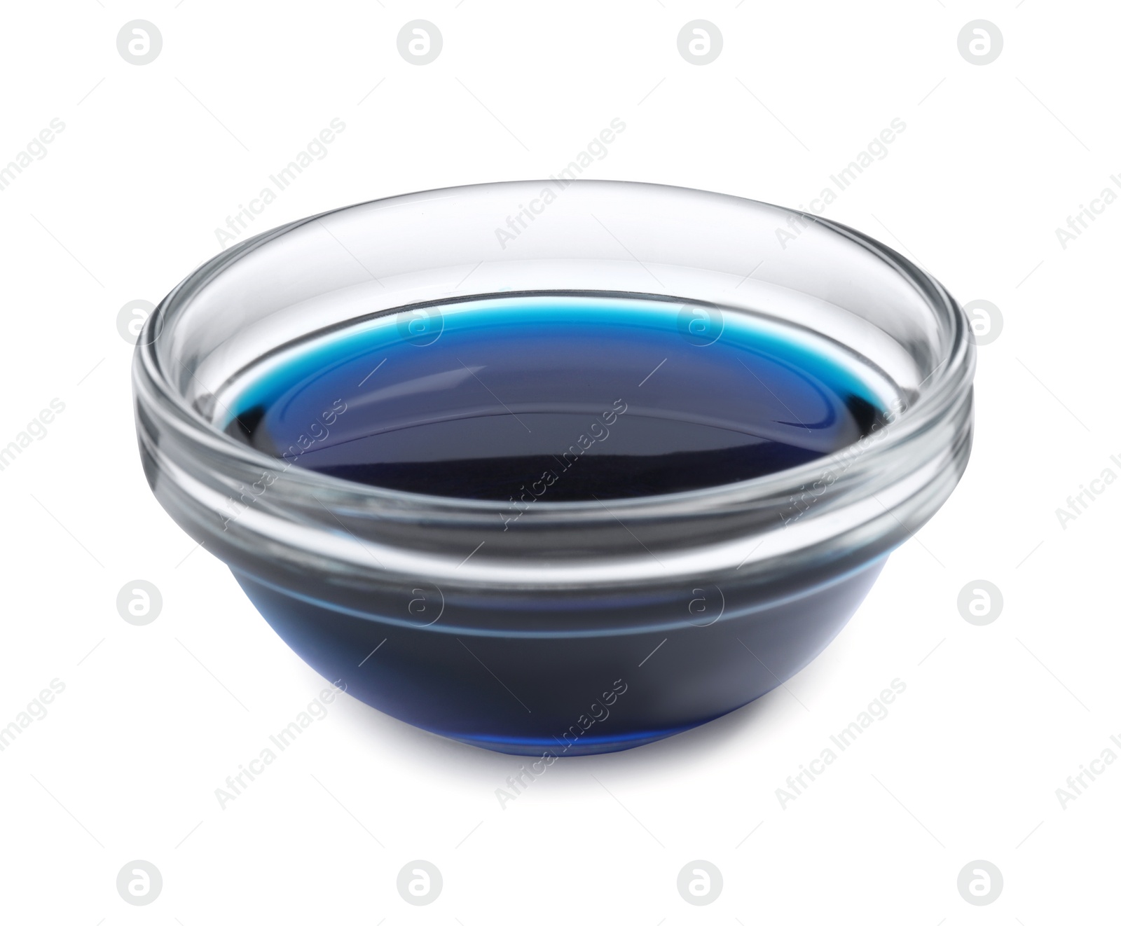 Photo of Glass bowl with blue food coloring isolated on white