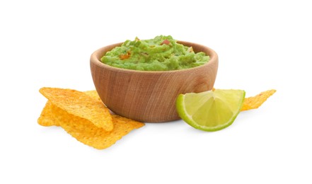 Photo of Bowl of delicious guacamole with tortilla chips and lime isolated on white