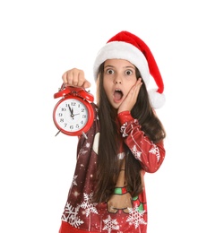 Photo of Girl in Santa hat with alarm clock on white background. Christmas countdown