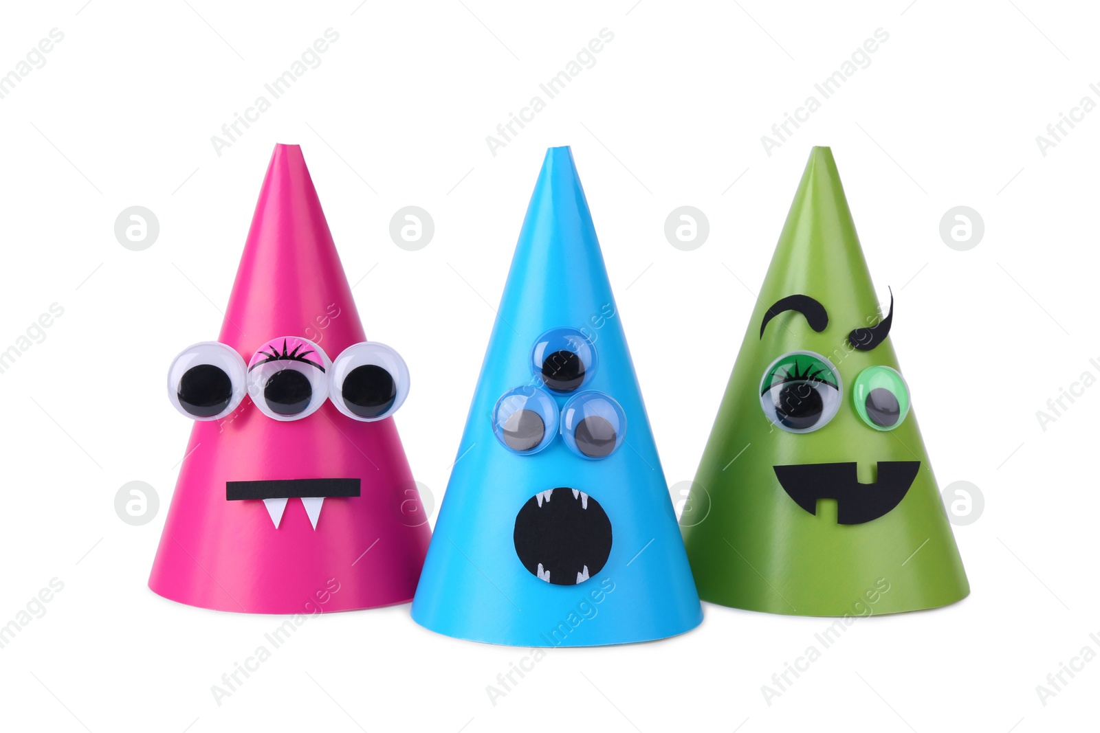 Photo of Funny handmade monsters isolated on white. Halloween decoration