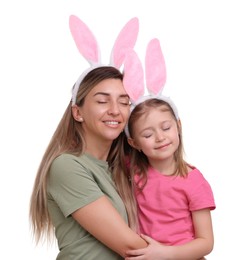 Photo of Easter celebration. Mother and her cute daughter with bunny ears isolated on white