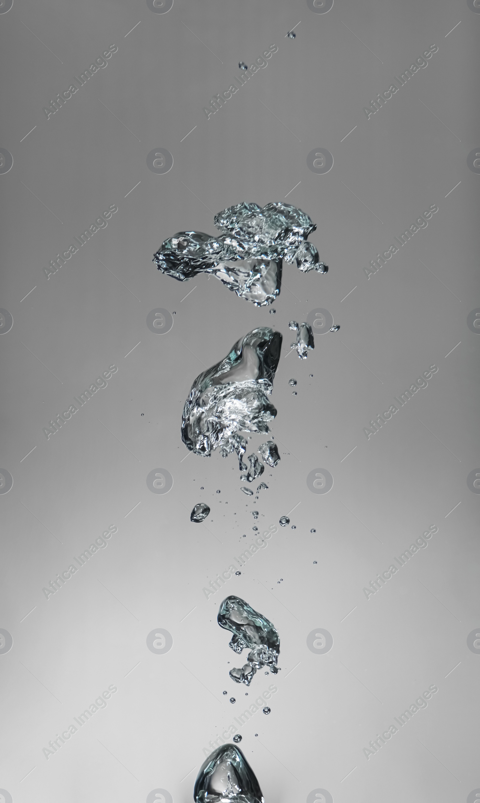 Photo of Air bubbles in water on white background