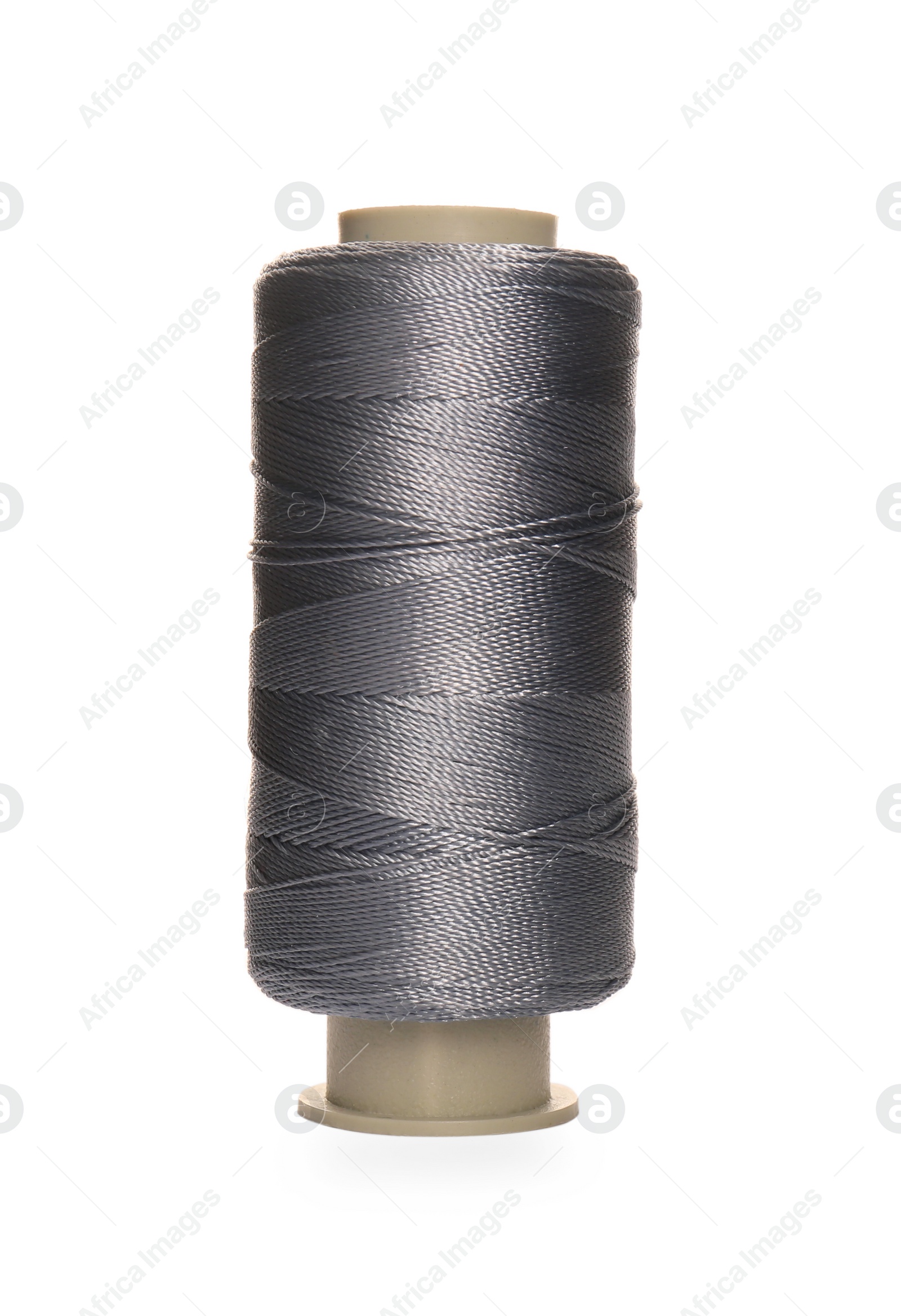 Photo of Spool of grey sewing thread isolated on white