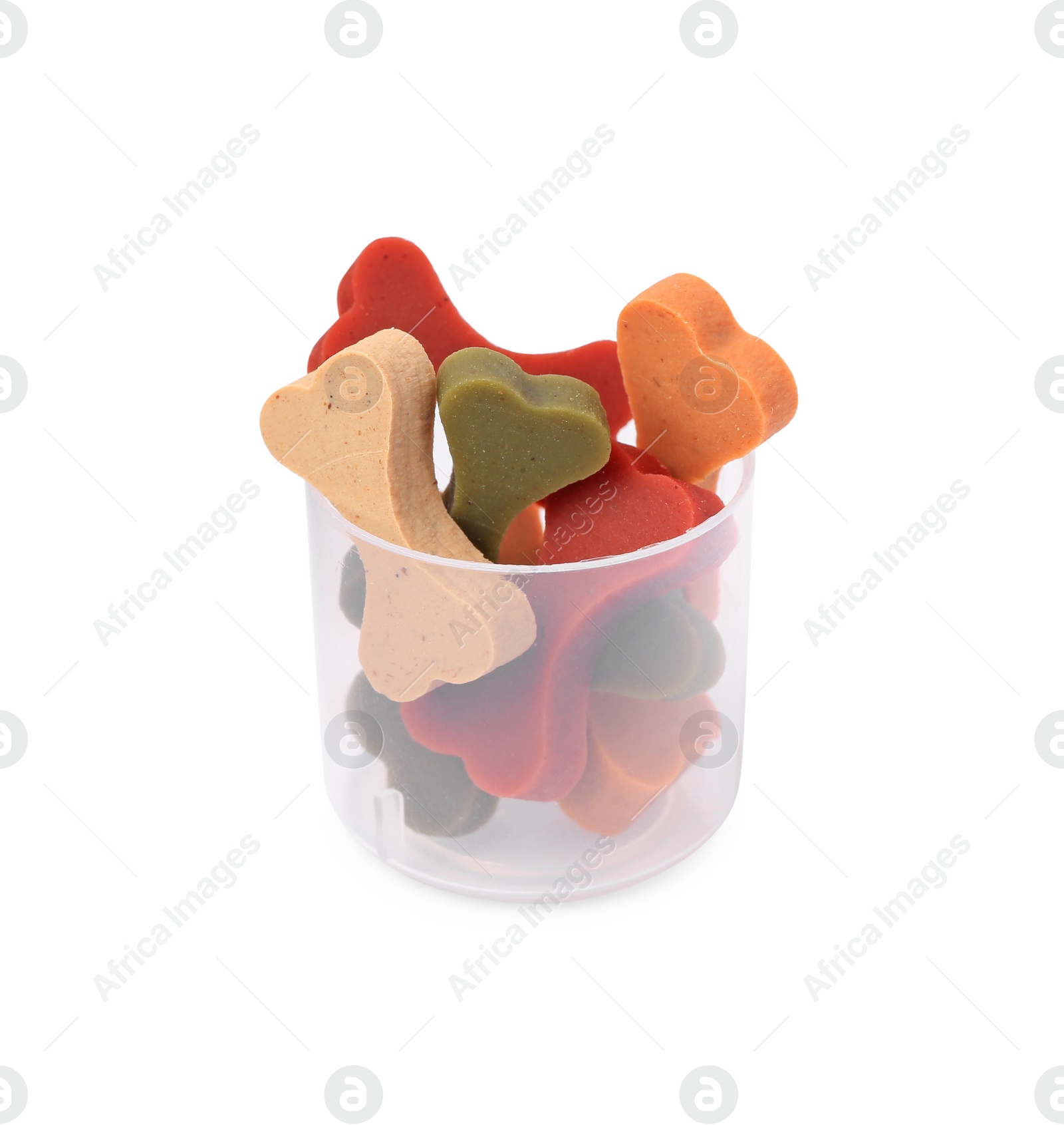 Photo of Bone shaped vitamins for pets in plastic container isolated on white