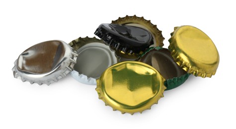 Group of different beer bottle caps isolated on white