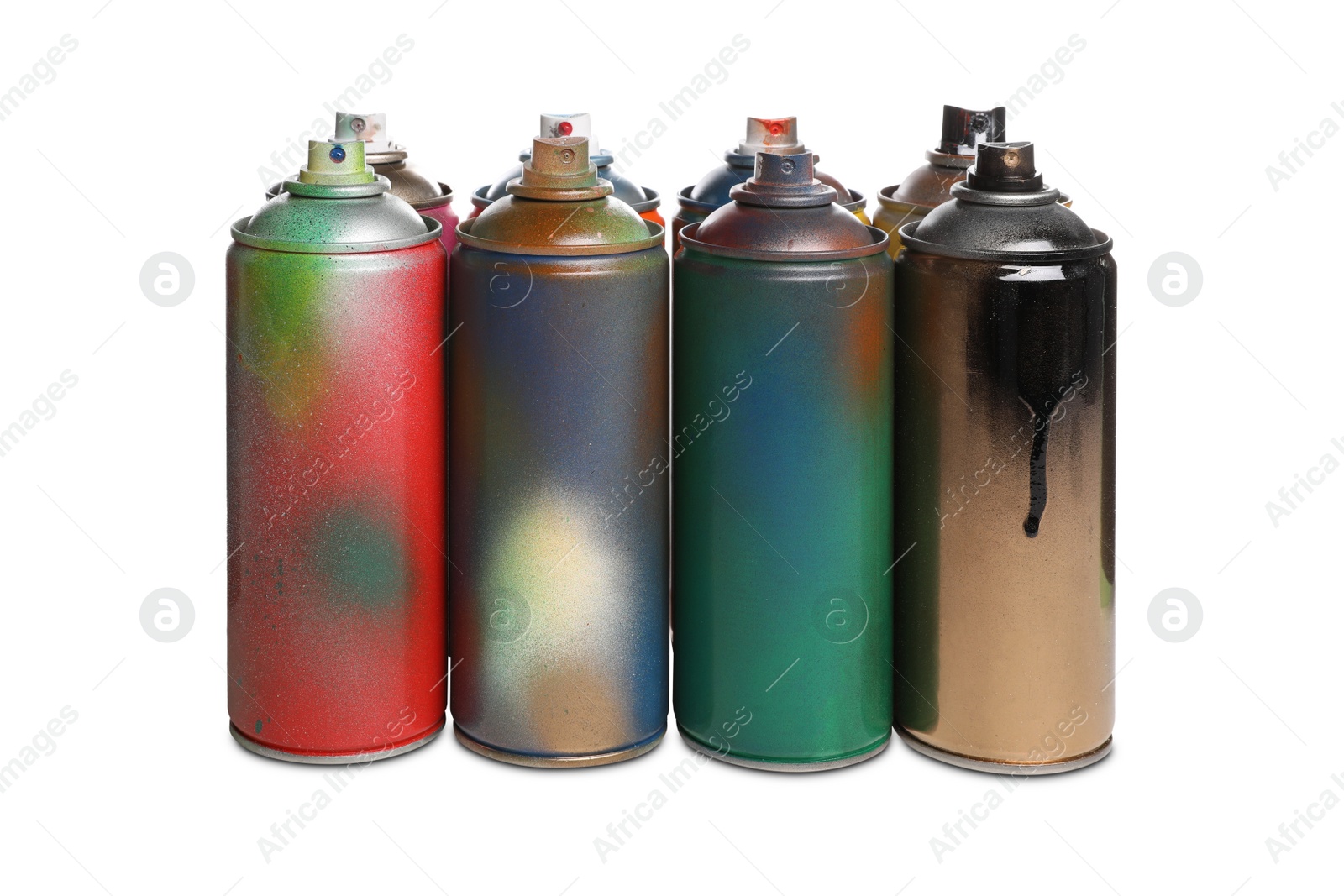 Photo of Used cans of spray paints on white background