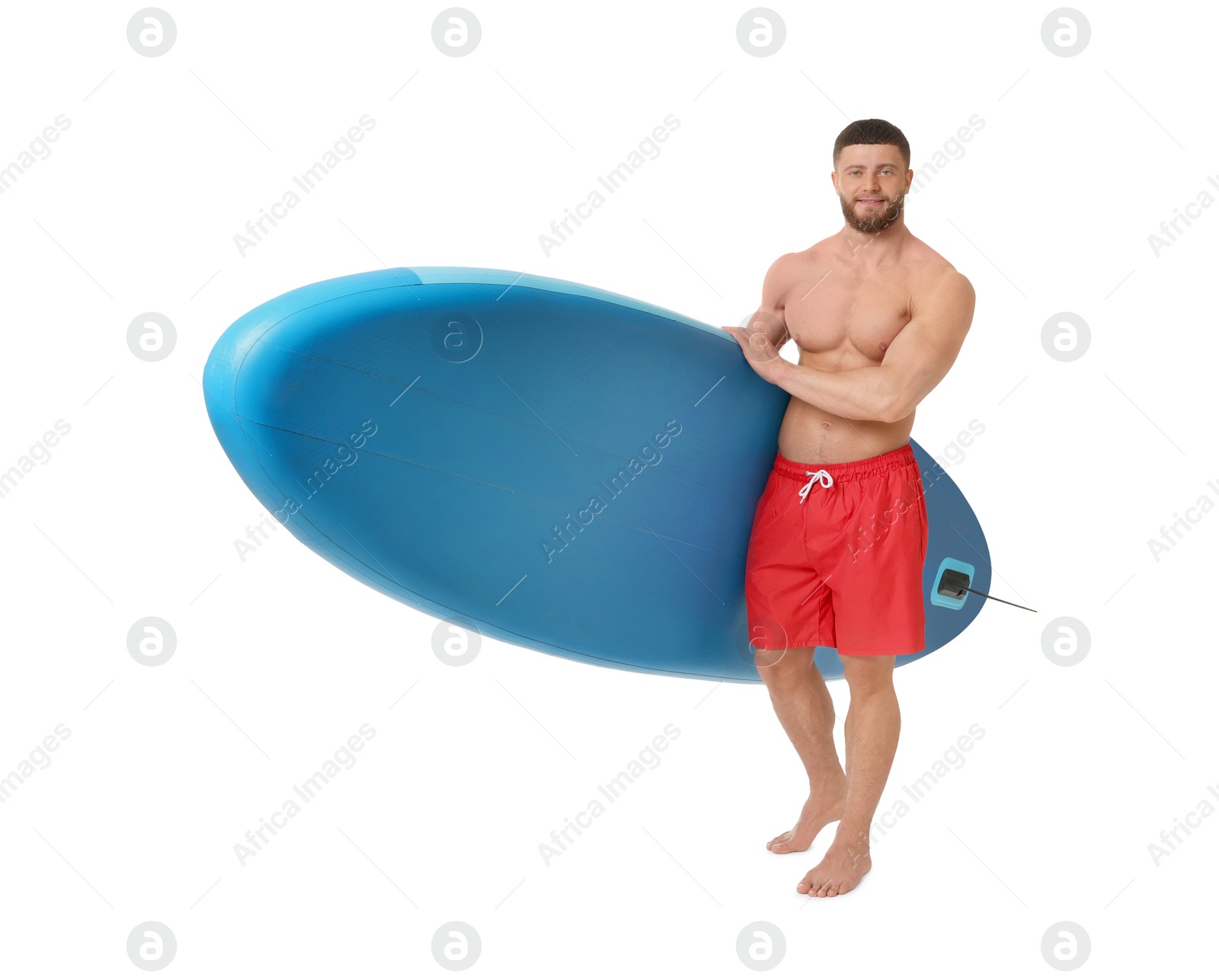 Photo of Handsome man with blue SUP board on white background