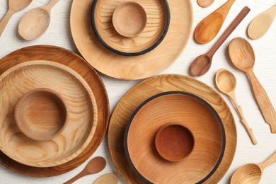 Cooking utensils on white wooden table, flat lay