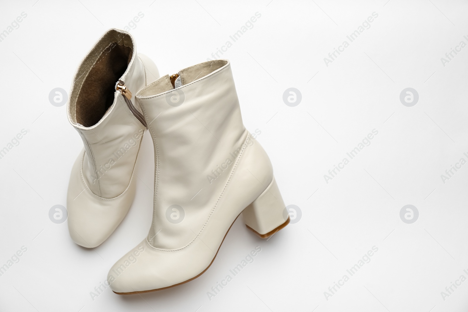 Photo of Pair of stylish leather shoes on white background, above view