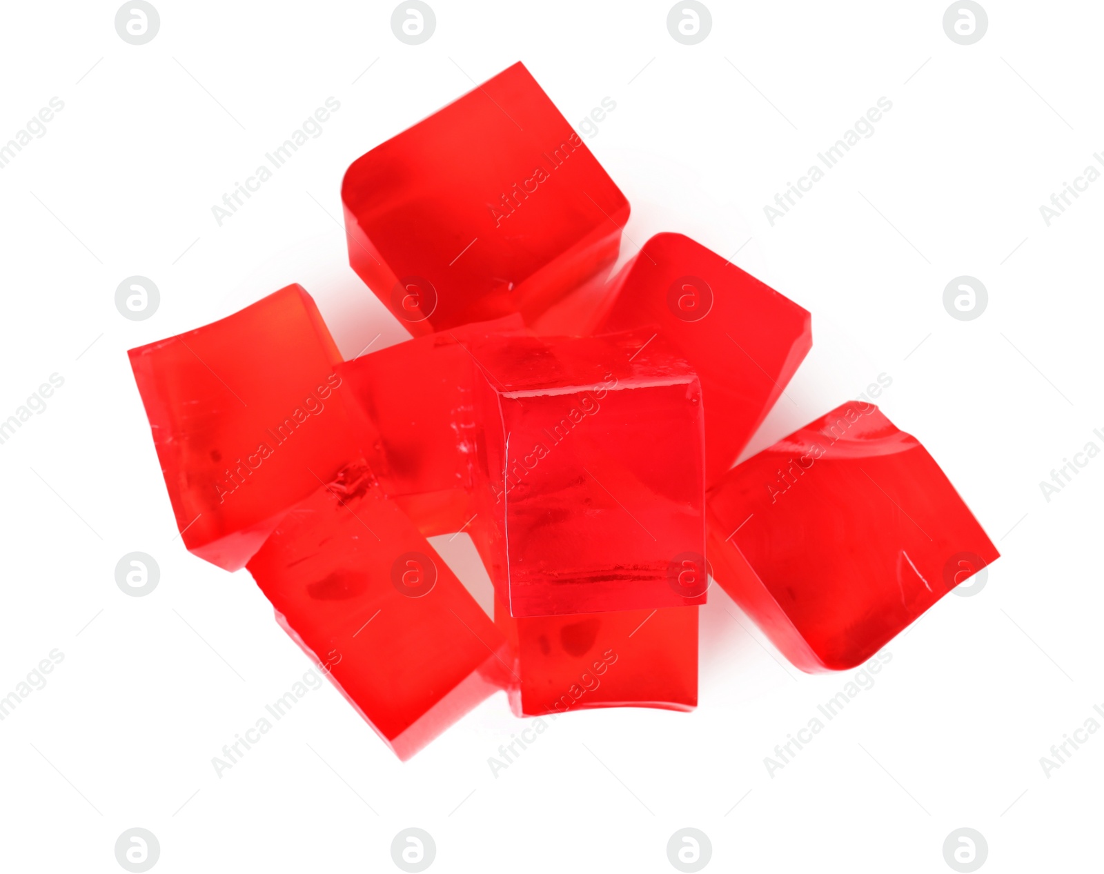 Photo of Heap of red jelly cubes on white background, top view