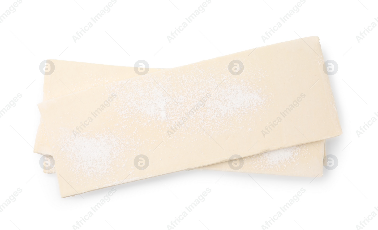 Photo of Raw puff pastry dough isolated on white, top view