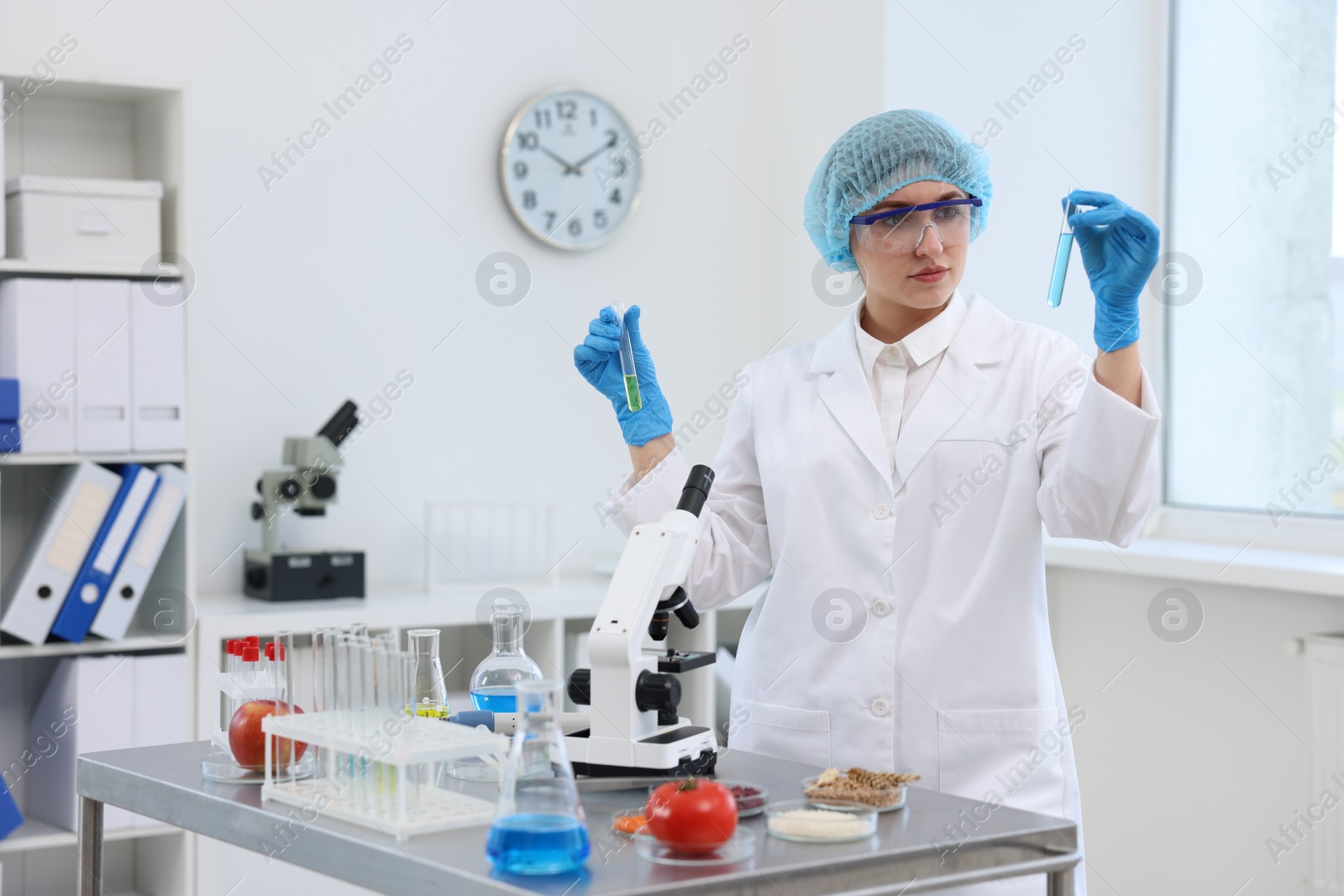 Photo of Quality control. Food inspector checking safety of products in laboratory