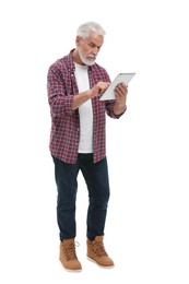 Senior man using tablet on white background