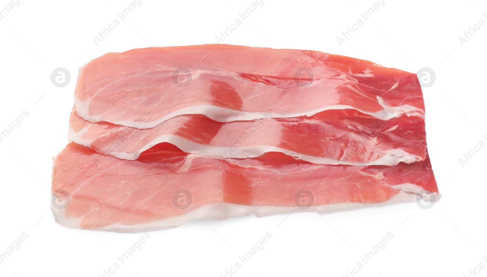 Photo of Slices of delicious jamon isolated on white