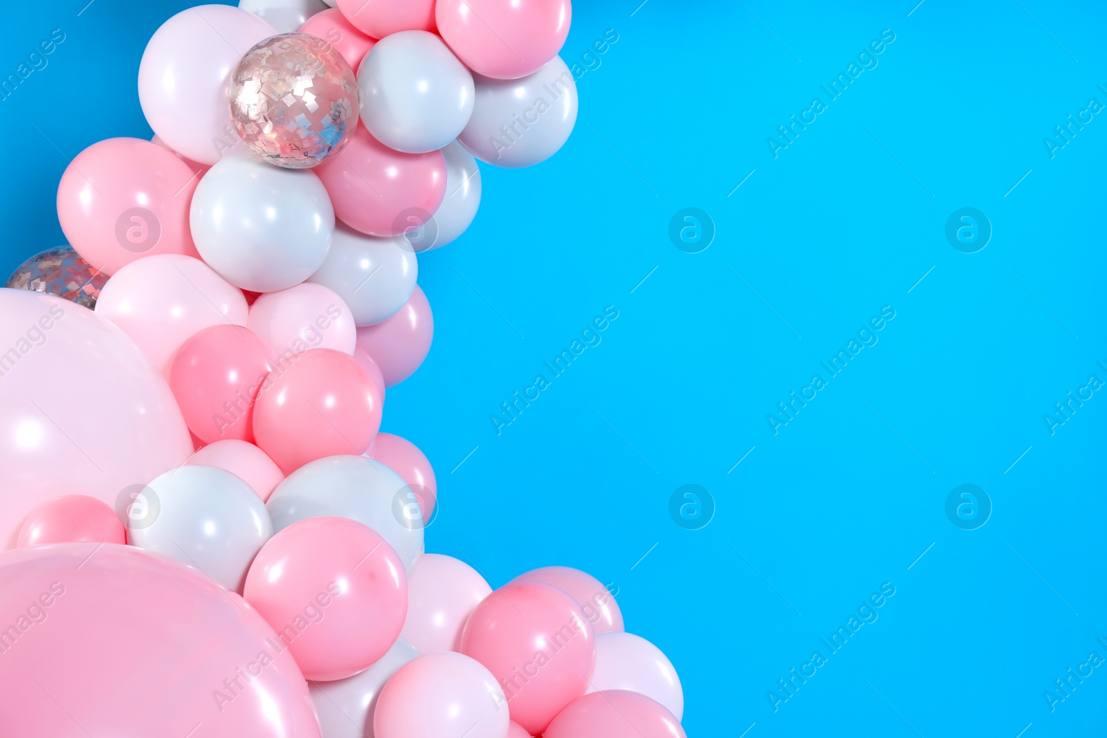 Photo of Beautiful composition with balloons on blue background. Space for text