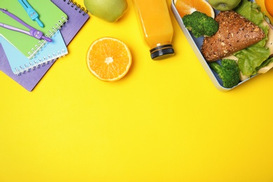 Photo of Flat lay composition with healthy food for school child and space for text on color background