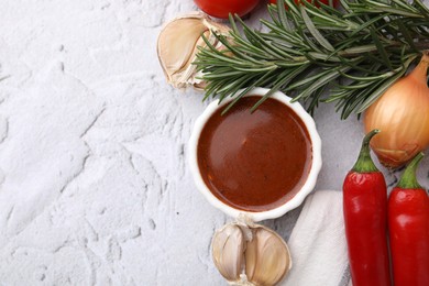 Photo of Fresh marinade and different ingredients on light grey textured table, flat lay. Space for text