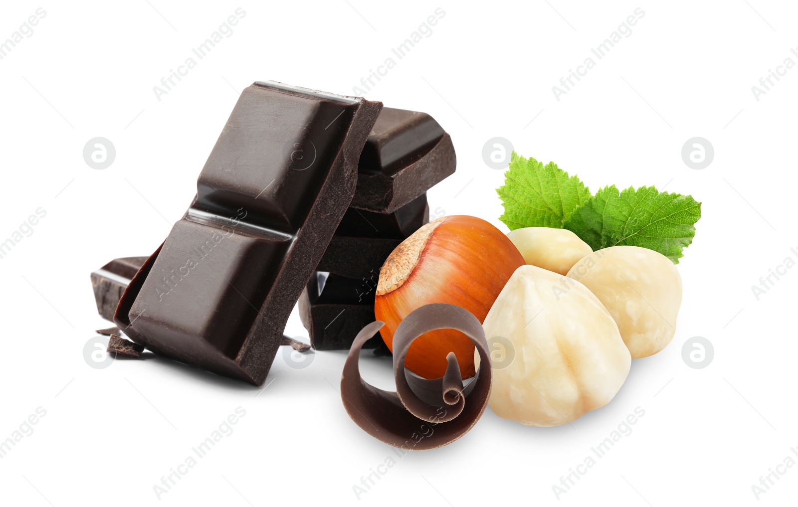 Image of Dark chocolate and hazelnuts isolated on white