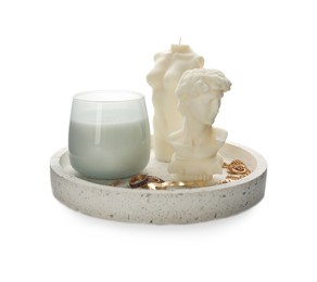 Photo of Beautiful sculptural candles and accessories on white background
